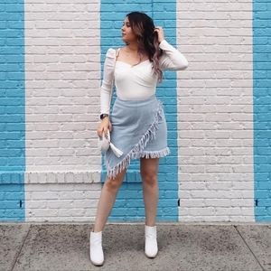2/$10 Asymmetrical distressed fringe skirt